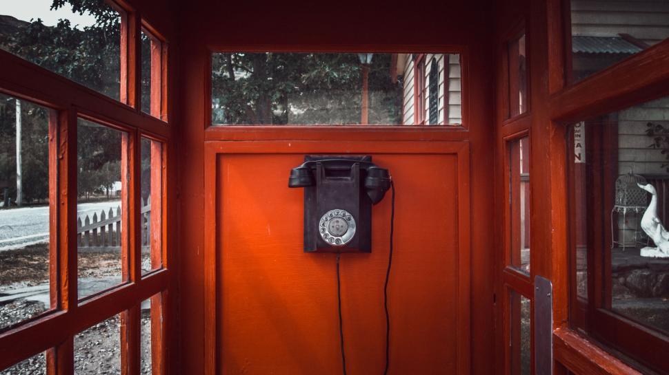 Free Image of Red Door With Phone 
