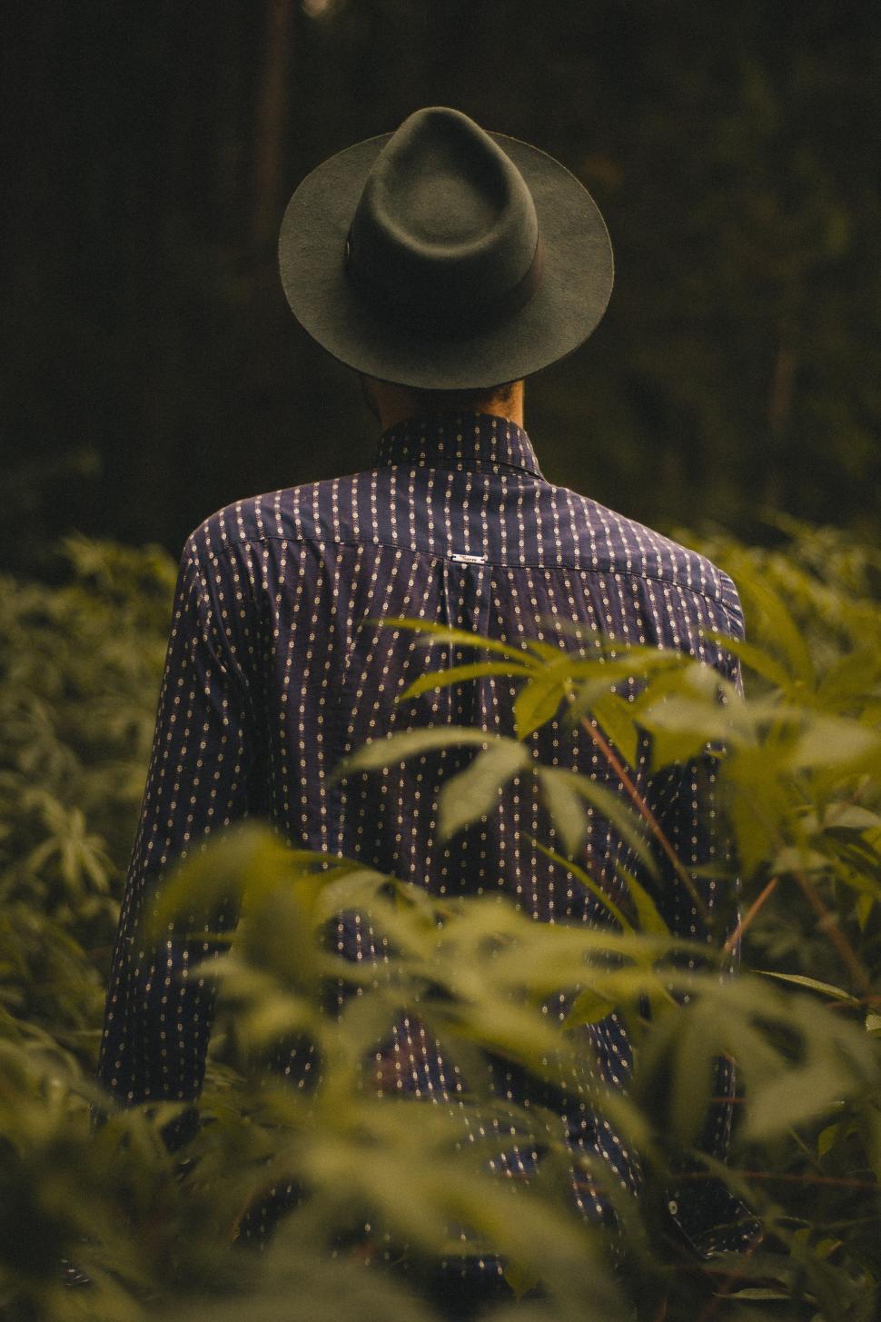 Free Image of Person Wearing Hat Standing in Field 