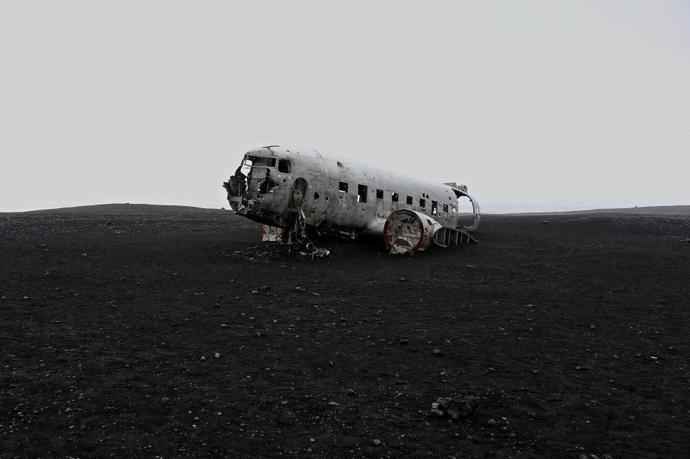 Free Image of Abandoned Plane Stuck in Dirt 