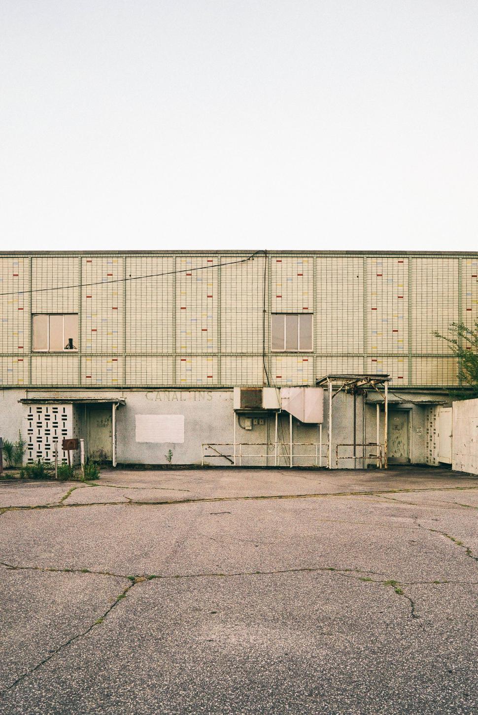 Free Image of Empty Parking Lot in Front of Building 