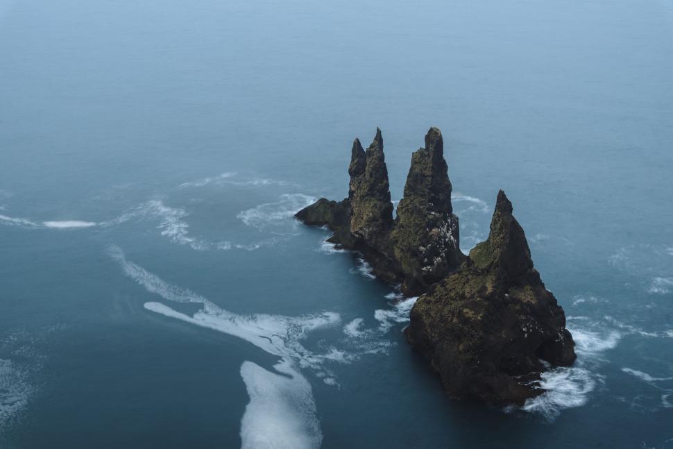Free Image of Aerial View of Rocks in the Ocean 