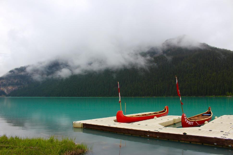 Free Image of Two Canoes on Dock by Mountain Lake 