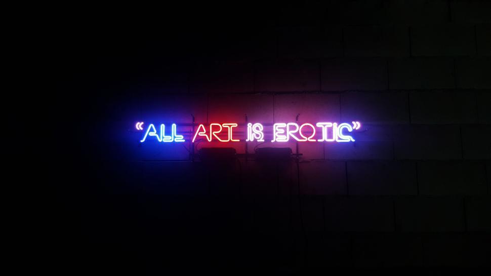 Free Image of Neon Sign: All Art Is Erotic 