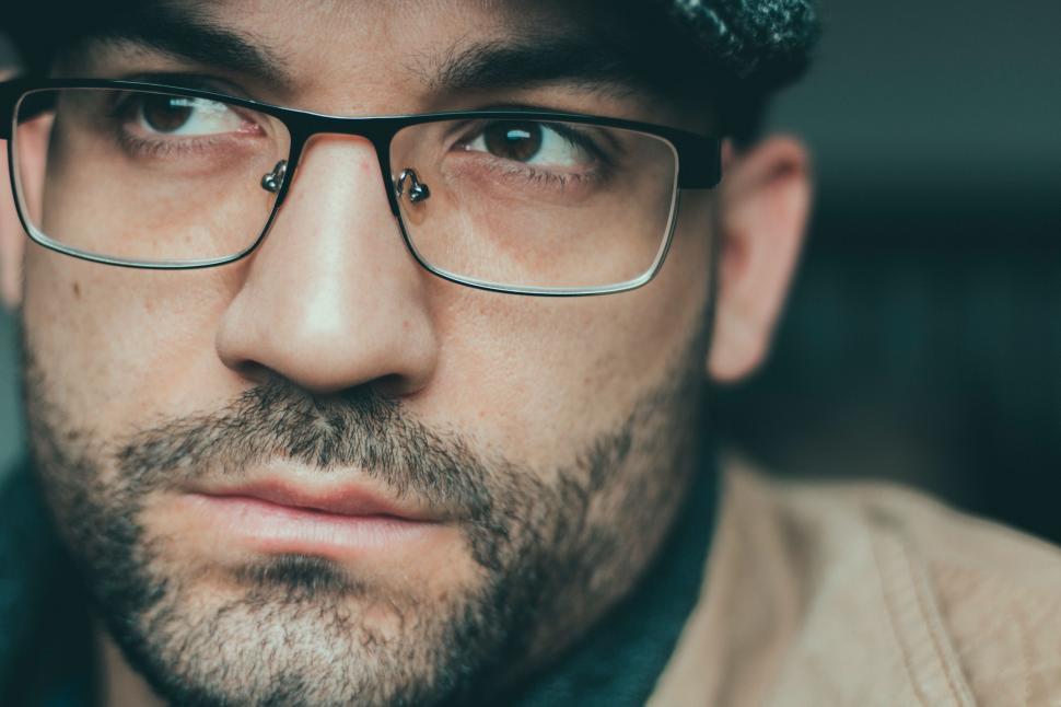 Free Image of Close Up Portrait of Man in Glasses and Hat 