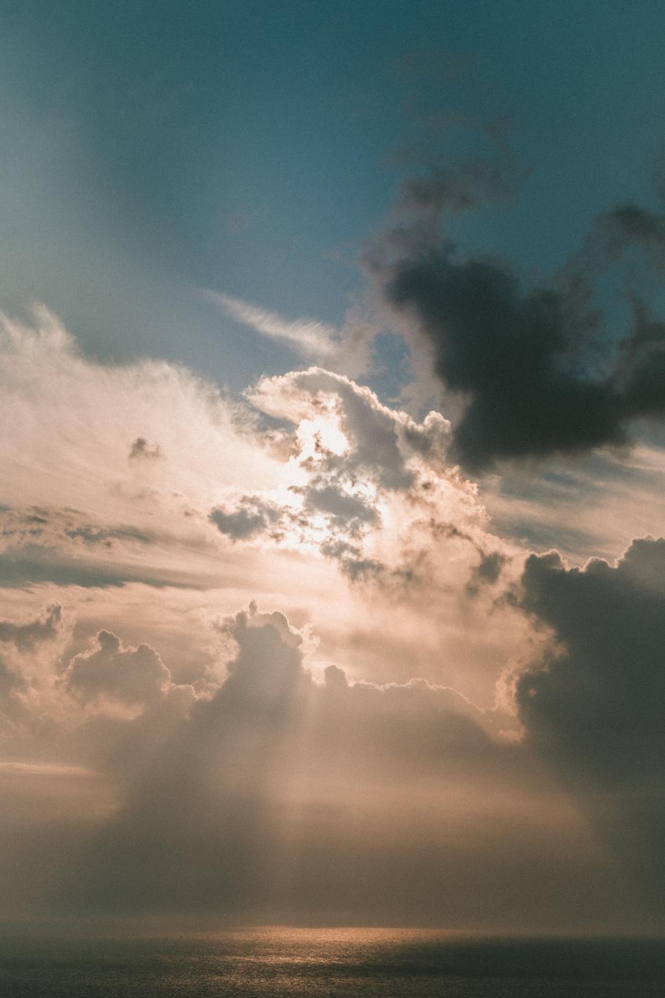 Free Image of atmosphere sky clouds weather sun cloud sunset landscape cloudscape sunlight heaven light environment summer air day clear outdoors sunrise fluffy cloudy high spring horizon 