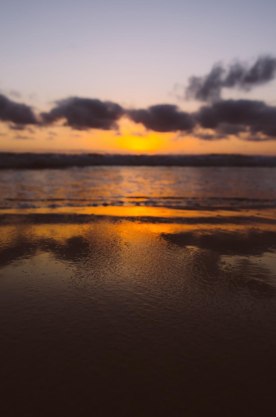 Free Image of Sun Setting Over Water 