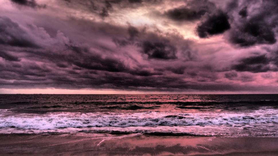 Free Image of Cloudy Sky Over the Ocean 