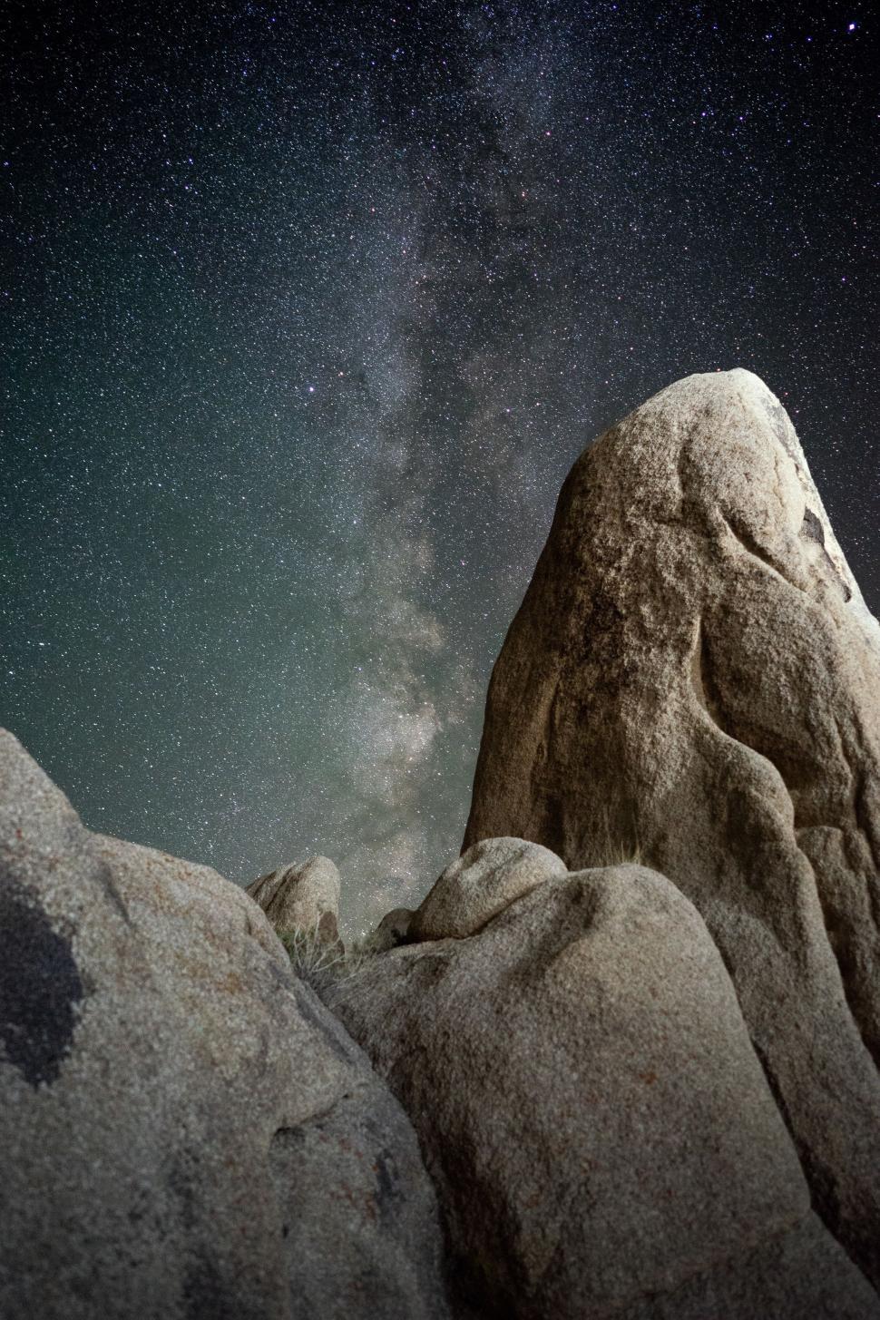 Free Image of Starry Sky Over Rock Formation 