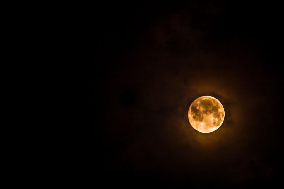 Free Image of Full Moon Illuminating Dark Sky With Clouds 