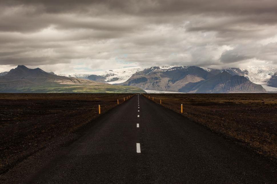 Free Image of Scenic Road With Mountains in Background 
