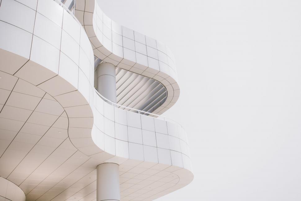 Free Image of Towering Building With Spiral Staircase 