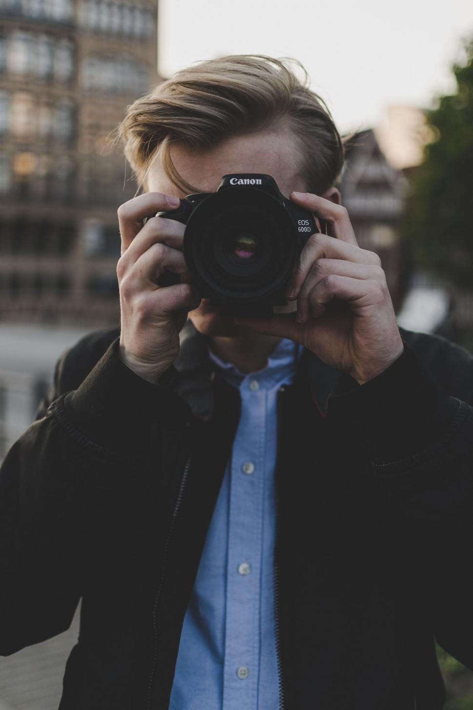 Free Image of Man Taking Picture of Himself With Camera 
