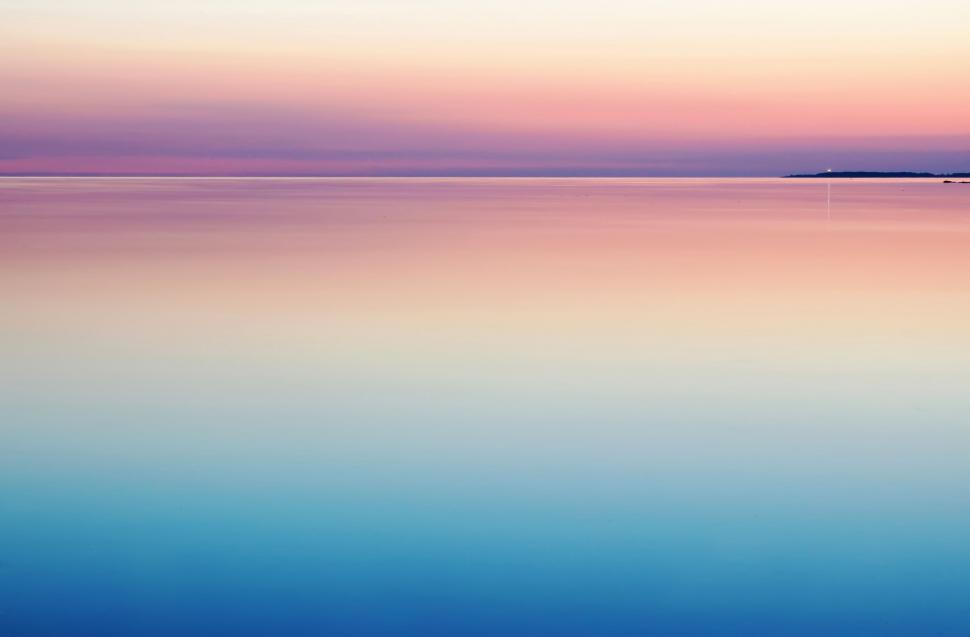 Free Image of Purple Sky Over Large Body of Water 