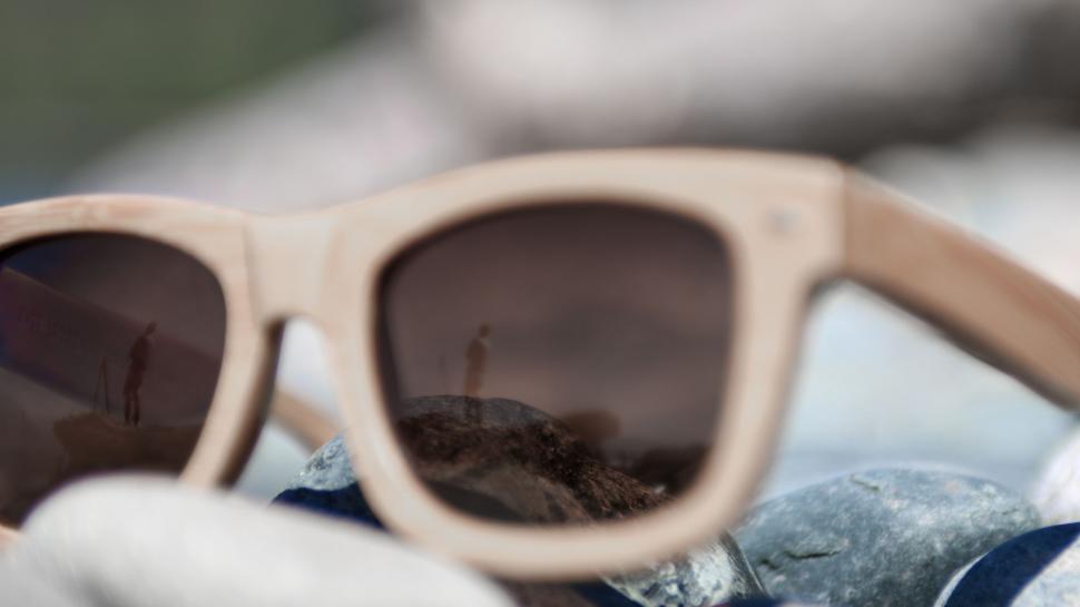 Free Image of Sunglasses Resting on Table 