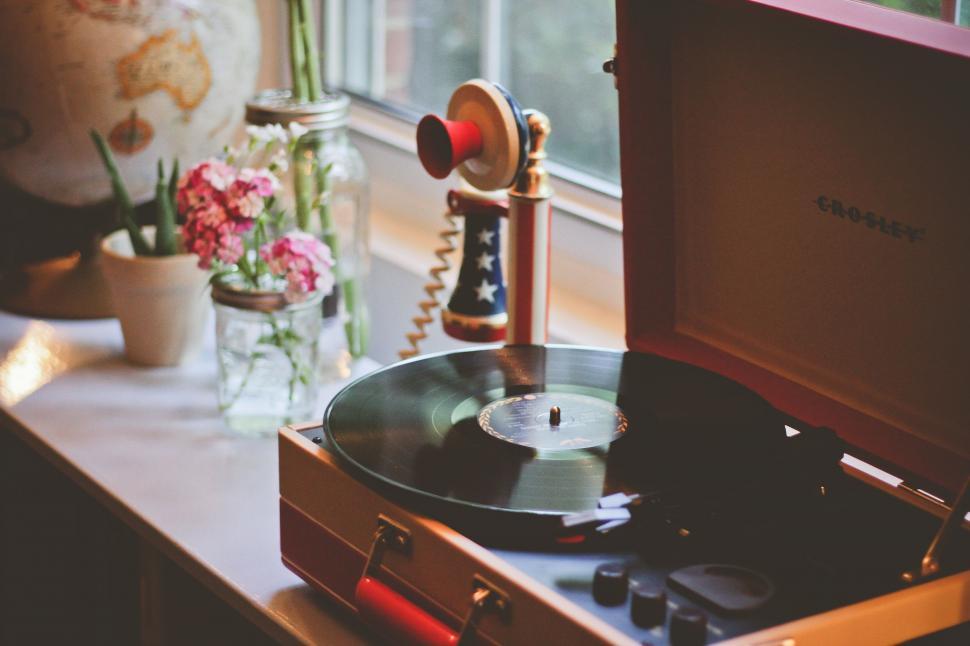 Free Image of Record Player on Table by Window 