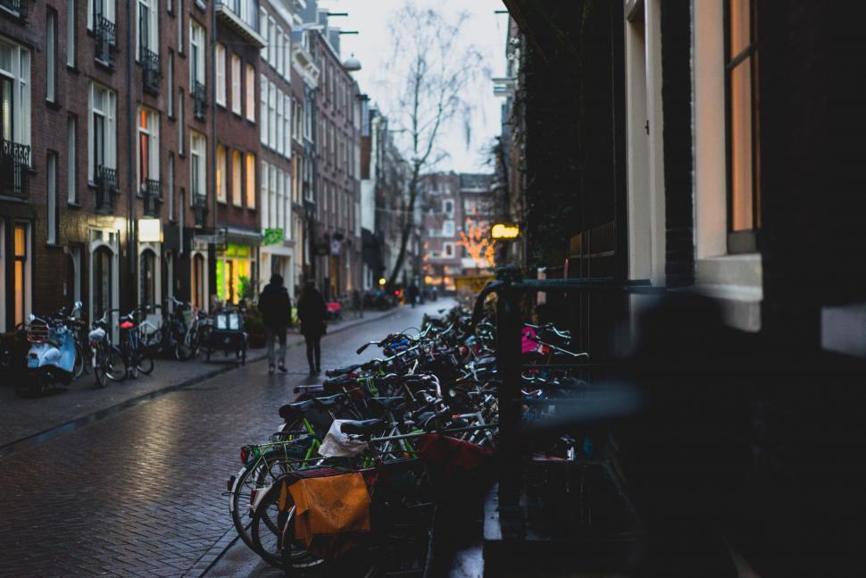 Free Image of Row of Bikes Parked on Side of Street 