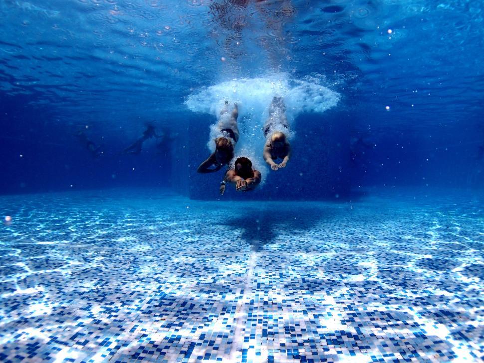 Free Image of Person Swimming Underwater in Pool 