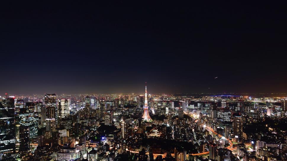 Free Image of Nighttime Cityscape View From Rooftop 