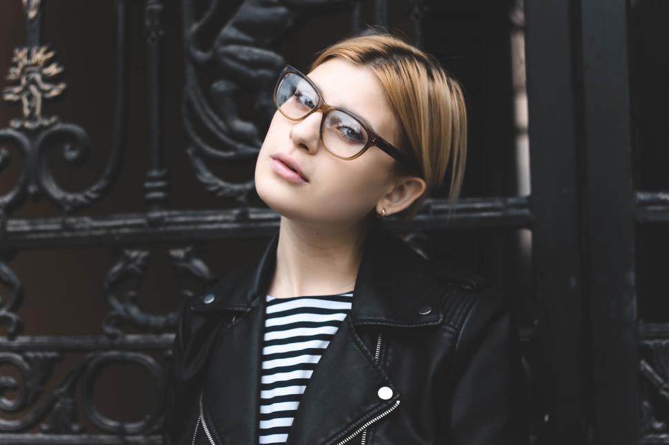 Free Image of Woman in Black Leather Jacket and Glasses 