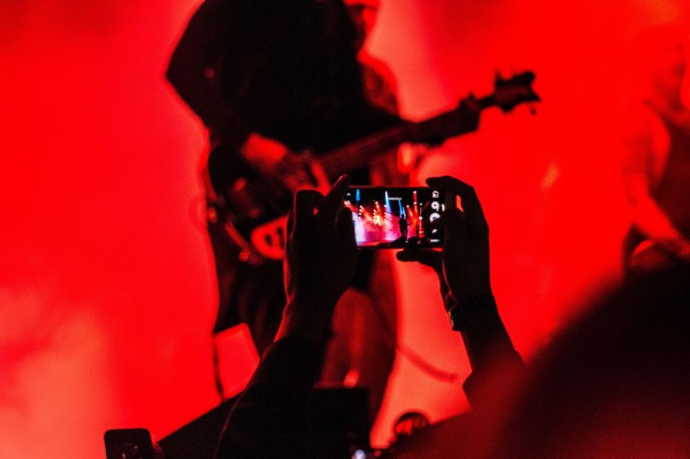 Free Image of Person Capturing Concert Moment With Cell Phone 
