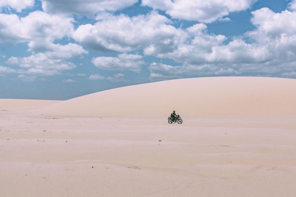 Free Image of Person Riding Motorcycle in Desert 