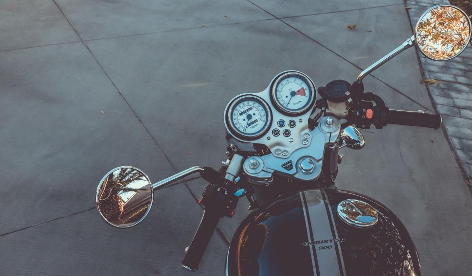 Free Image of Motorcycle Parked Alongside Road 