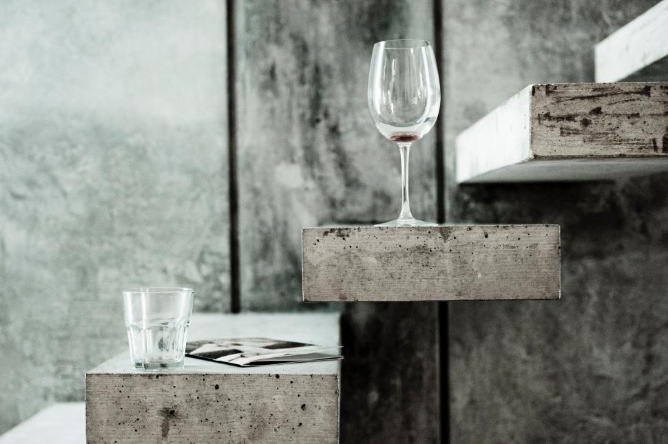 Free Image of Wine Glass on Cement Block 