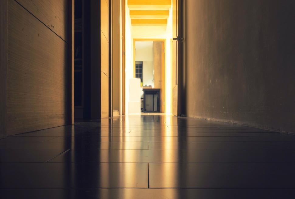 Free Image of Long Hallway Illuminated by Light 