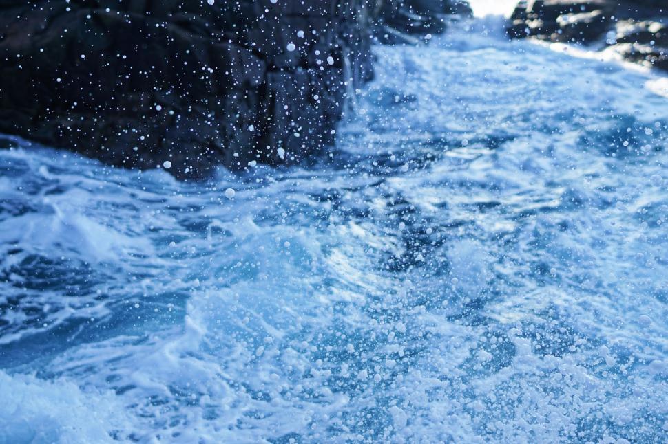 Free Image of Water Splashing on Rocks Near Shore 