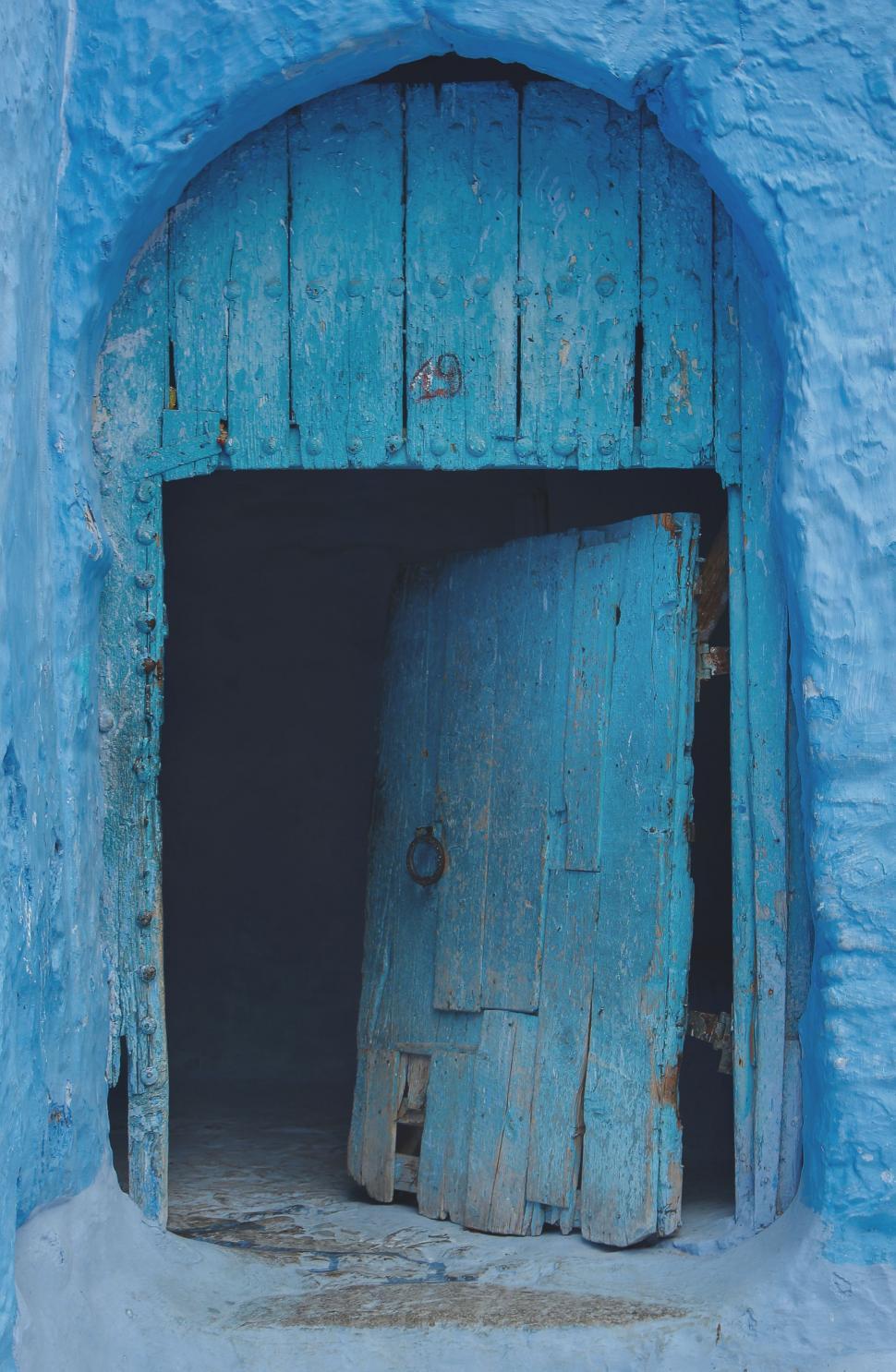 Free Image of Blue Building With Wooden Door 