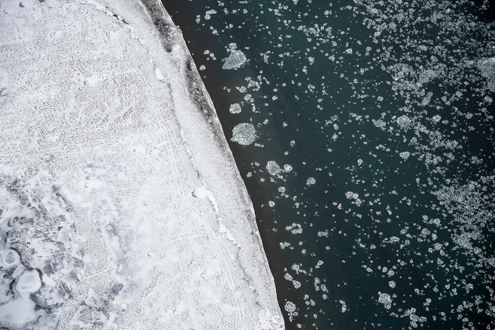 Free Image of Aerial View of Frozen Body of Water 