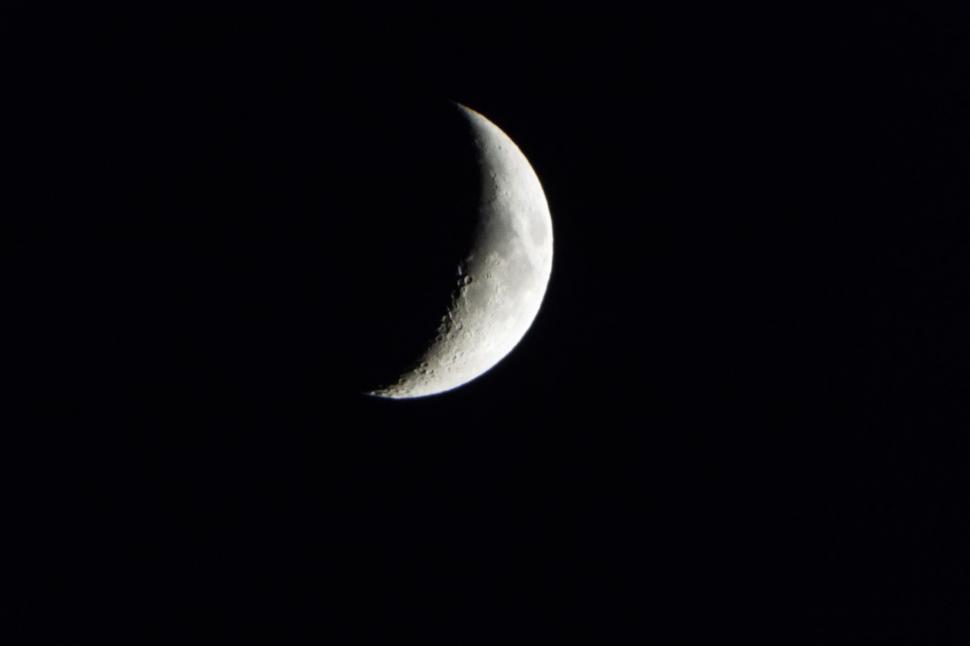 Free Image of Half Moon Shining in Dark Sky 