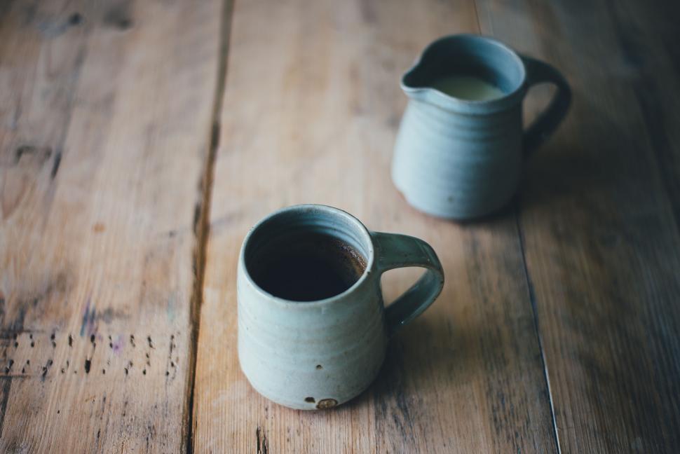 Free Image of Cups Placed on Wooden Table 