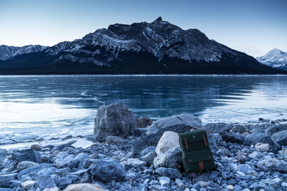 Free Image of Backpack on Rocky Beach by Waterfront 