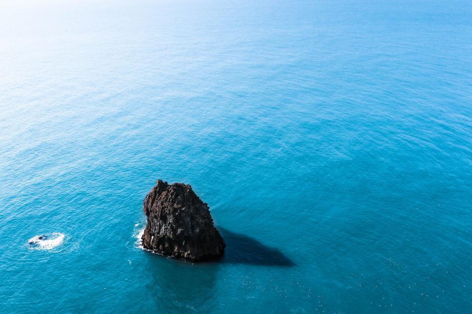 Free Image of Lone Rock in the Vast Ocean 