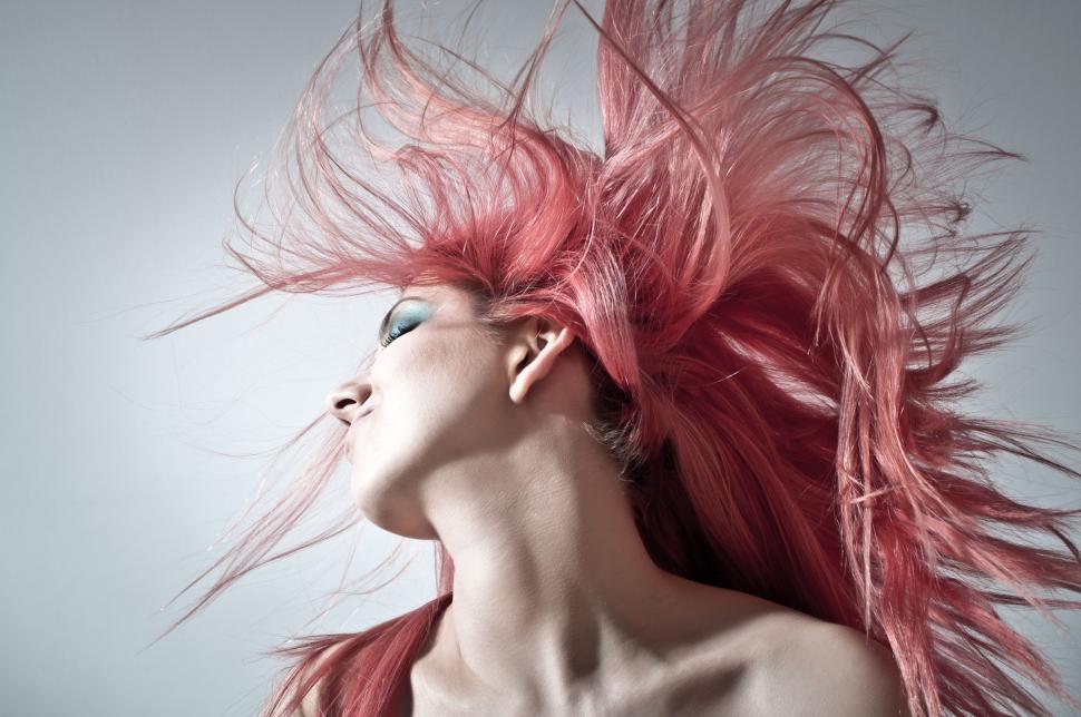 Free Image of Woman With Pink Hair Posing for Picture 