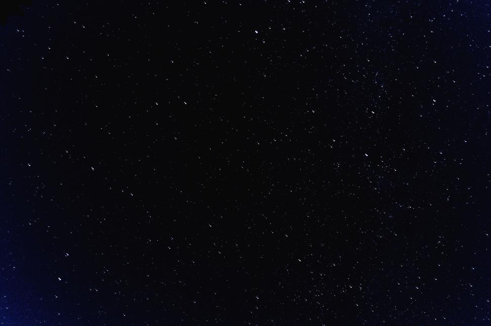 Free Image of Starry Night Sky Over Black Background 