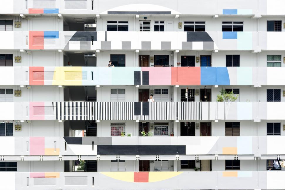 Free Image of Multicolored Building With Balconies and Terraces 