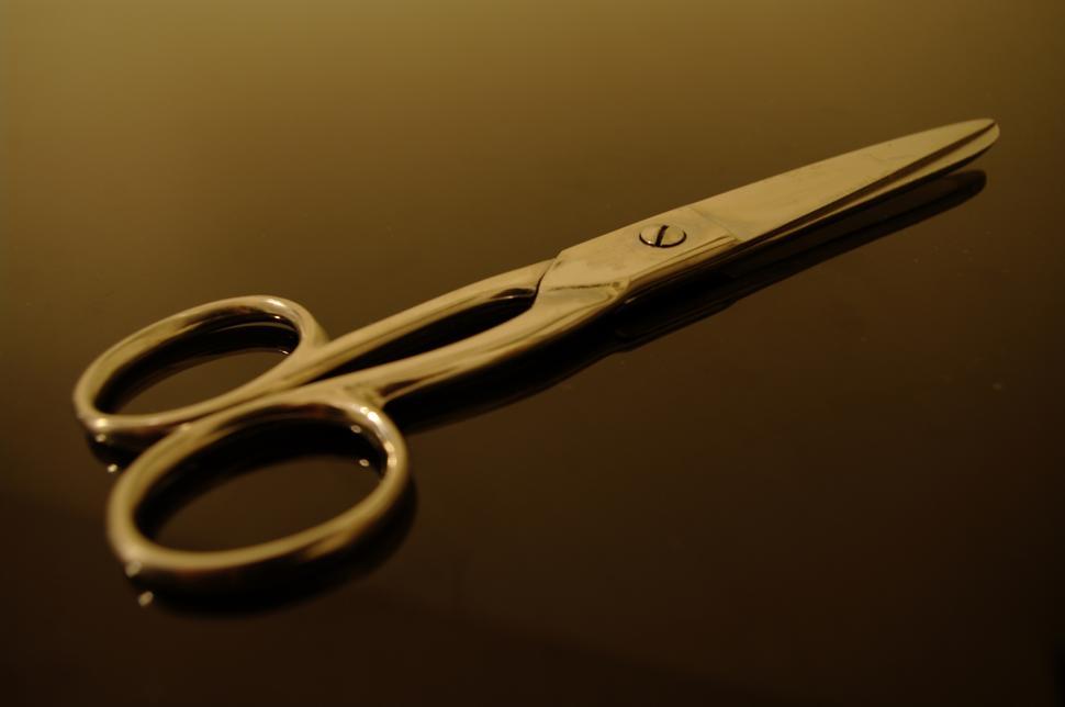 Free Image of A Pair of Scissors on a Table 