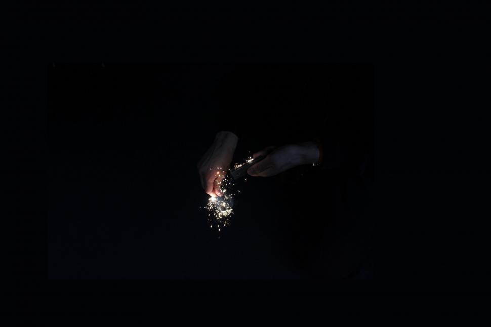 Free Image of Person Jumping in the Air in the Dark 