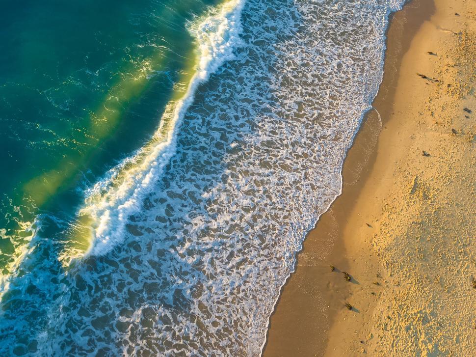 Free Image of A Birds Eye View of a Beach and Ocean 