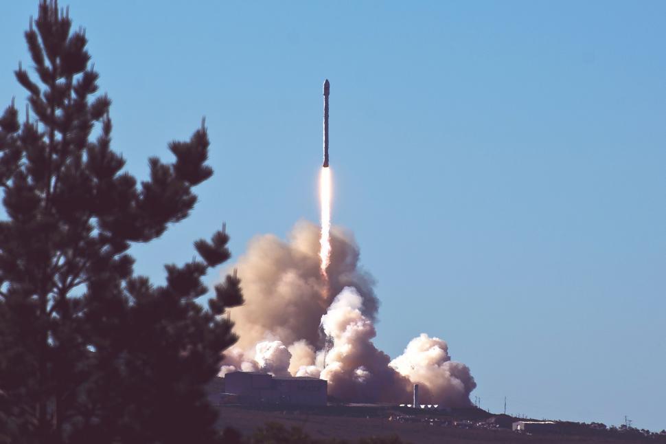 Free Image of Rocket Launch With Smoke Trail 