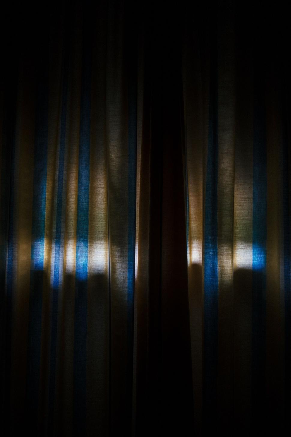 Free Image of Blurry Photo of a Curtain in the Dark 