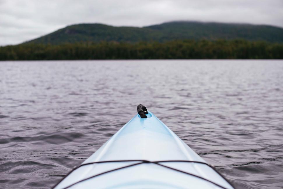 Free Image of Paddling Through a Lake in a Kayak 