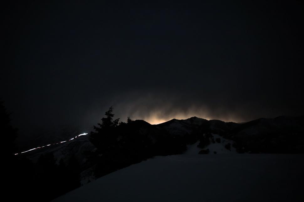 Free Image of Dark Mountain Silhouetted Against Night Sky 