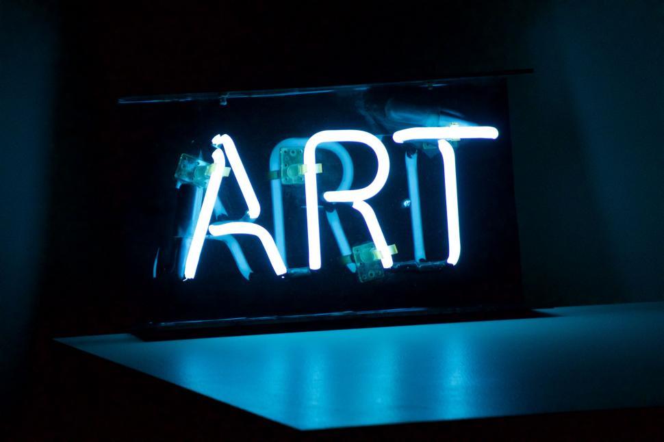 Free Image of Vibrant Neon Sign Saying Art 