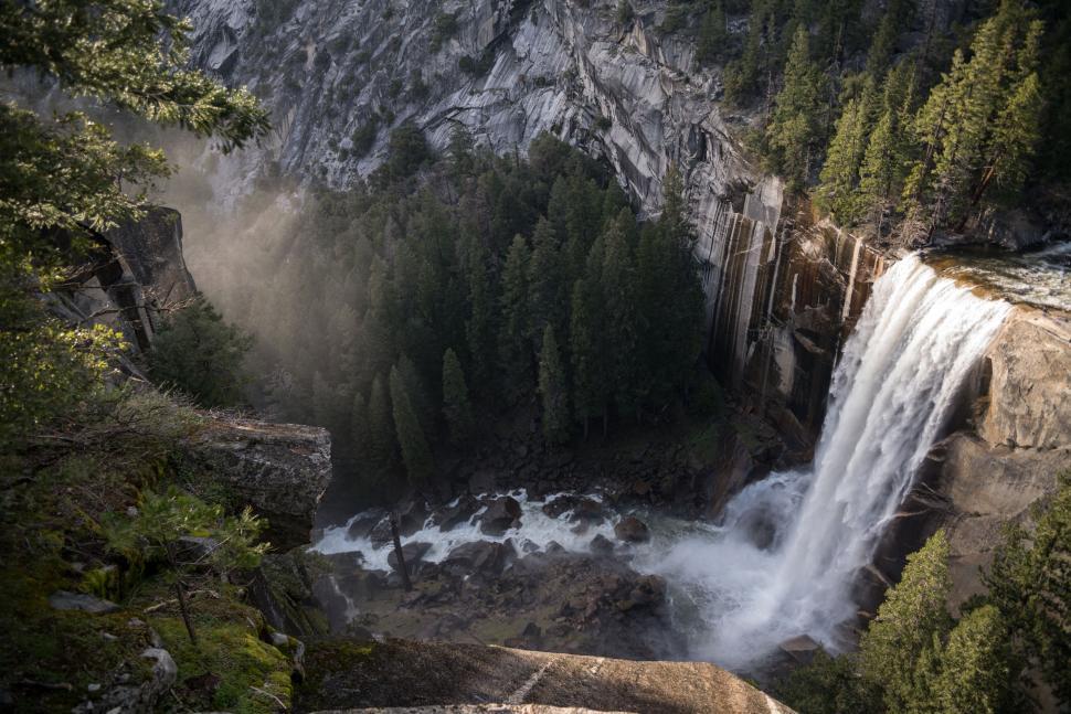 Free Image of Waterfall Flowing Down Rocks 