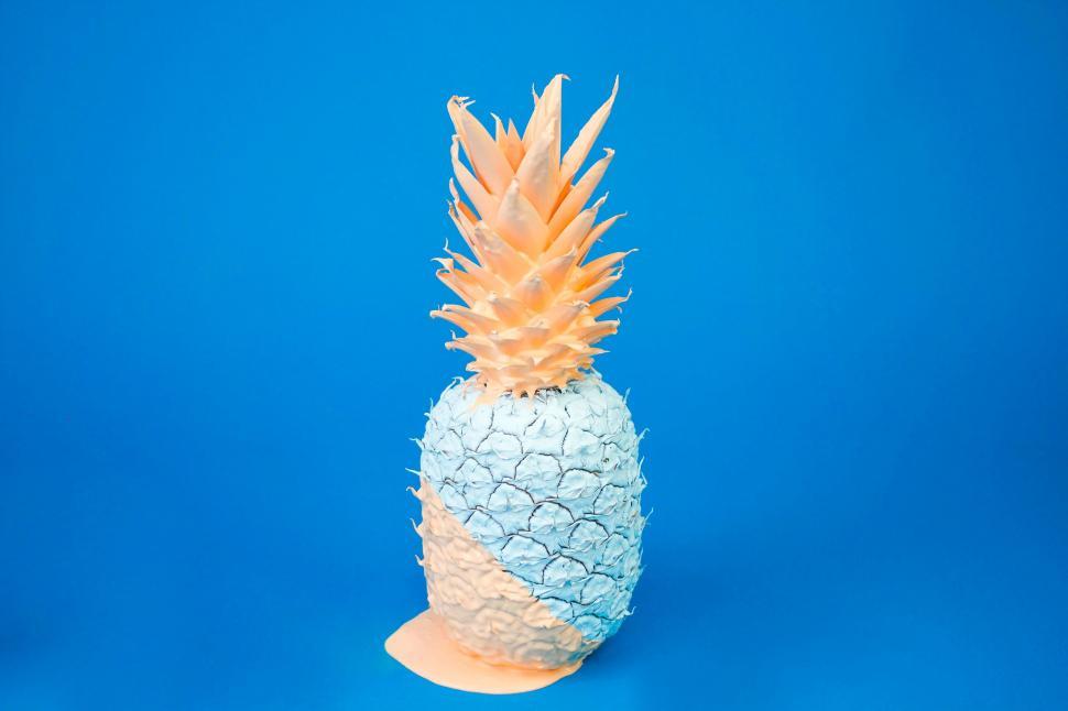 Free Image of Blue and White Pineapple on Blue Background 