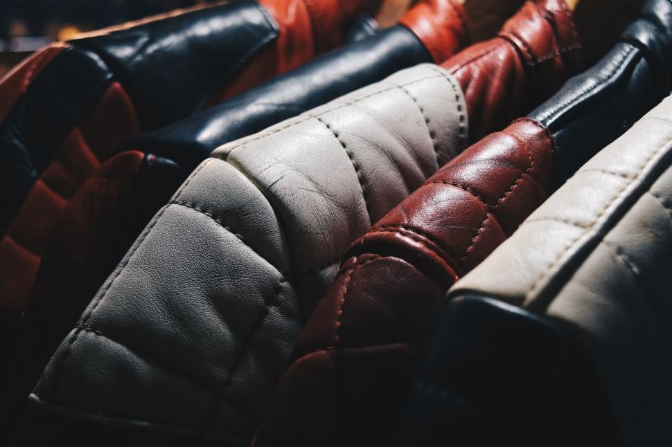 Free Image of Close Up of a Row of Different Colored Leathers 