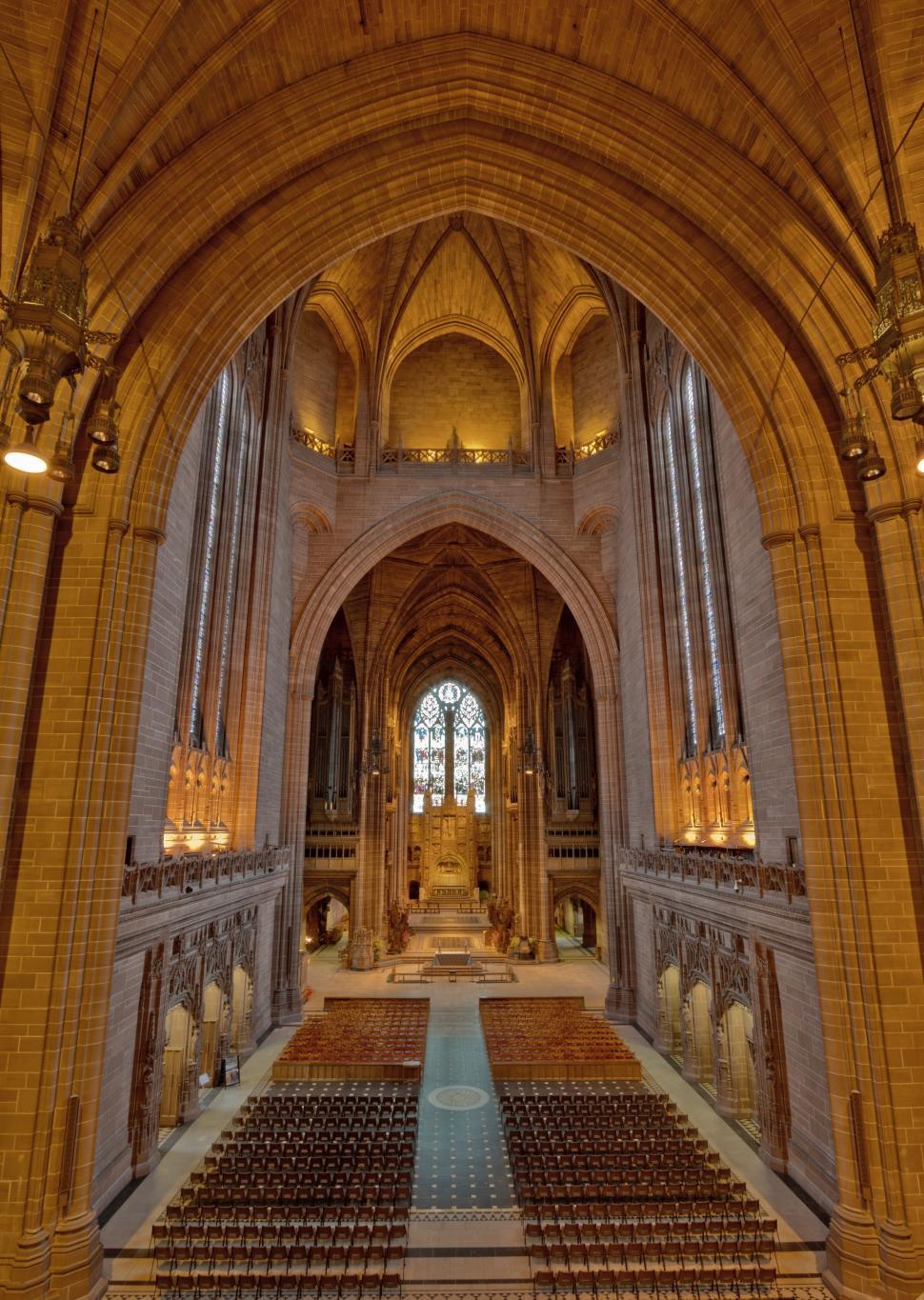 Free Image of Grand Cathedral Interior With Rows of Pews 